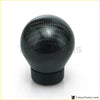 Black carbon fiber universal gear shift knob with glossy finish and textured weave pattern for cars