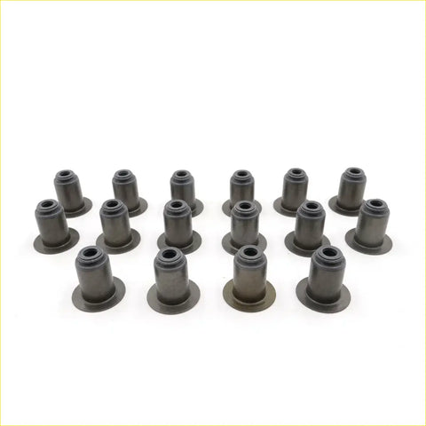 Black rubber valve stem oil seals arranged in a grid for Toyota Hilux Revo 2.4L 2.8L 2015-2023 models