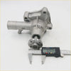 Silver metal water pump with cylindrical body and flanged base with engraved markings for toyota liteace and daihatsu delta