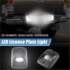 White led license plate light assembly with bright circular leds in black plastic for toyota 4wd ute offroad use