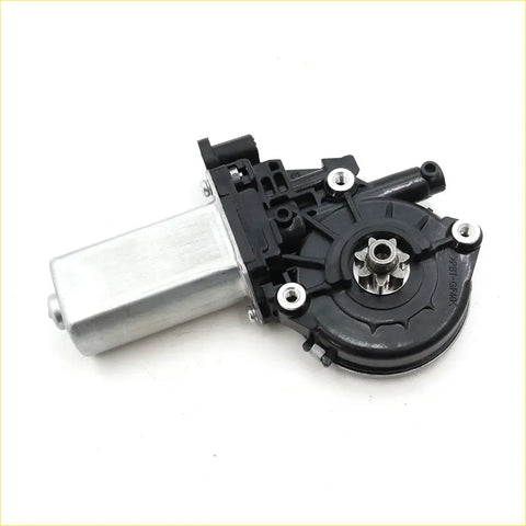 Black and silver car window motor regulator with cylindrical metal housing and plastic casing for toyota hilux 2004-2016