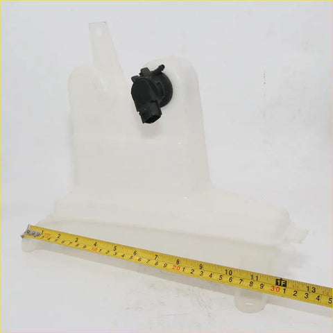 Translucent white plastic windscreen washer bottle seal with black cap and hose connector for toyota hilux sr5 mk6