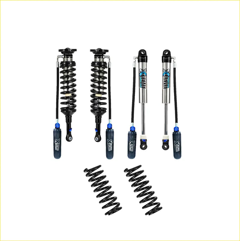 Set of four black and silver xrex shock absorbers with blue accents and two black coil springs for ford ranger lift kit