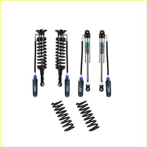 Set of four black and silver xrex shock absorbers with blue accents and two black coil springs for isuzu d-max lift kit
