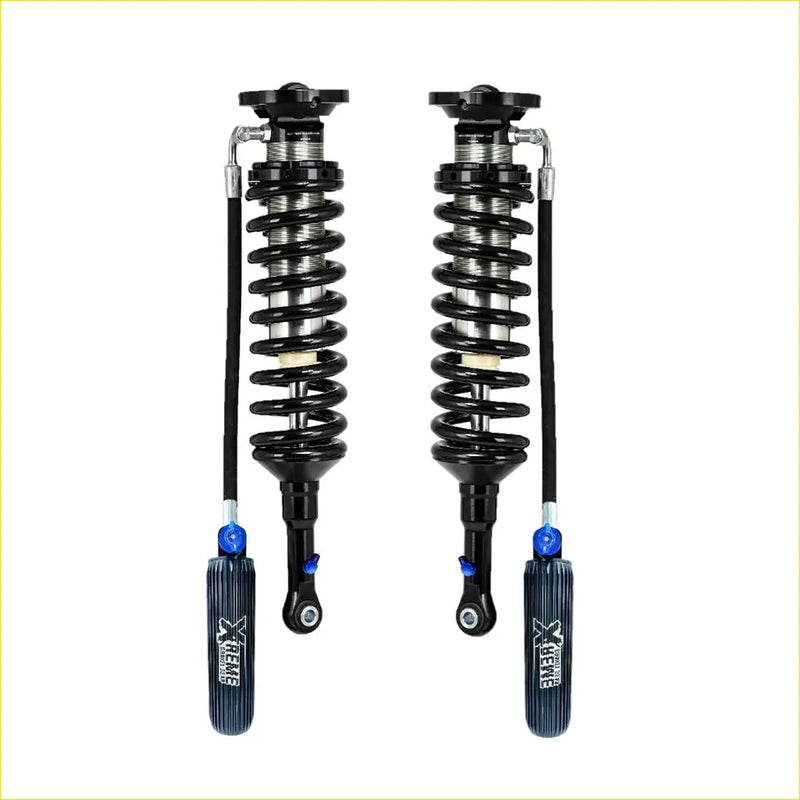 Black and silver coilover shocks with blue adjustment knobs branded xtreme for xgg pro xl lift kit toyota landcruiser 200 series
